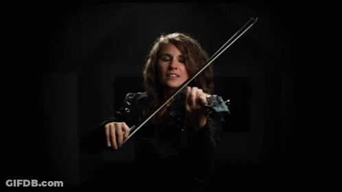 Woman In Black Jacket Playing Violin GIF