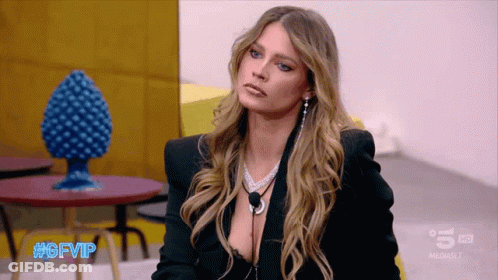 Woman In Black Jacket Plunging Neckline #Gfvip Table GIF