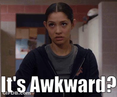 Woman In Black Jacket Saying Awkward GIF
