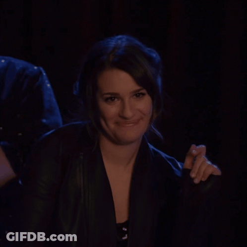 Woman In Black Jacket Smiling And Clapping GIF