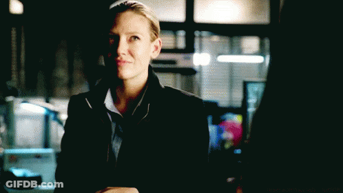 Woman In Black Jacket Smiling At Camera GIF