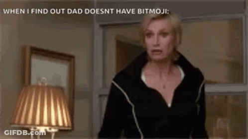 Woman In Black Jacket Standing In Front Of Lamp GIF