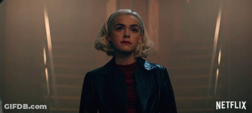 Woman In Black Jacket With Staircase And Netflix GIF