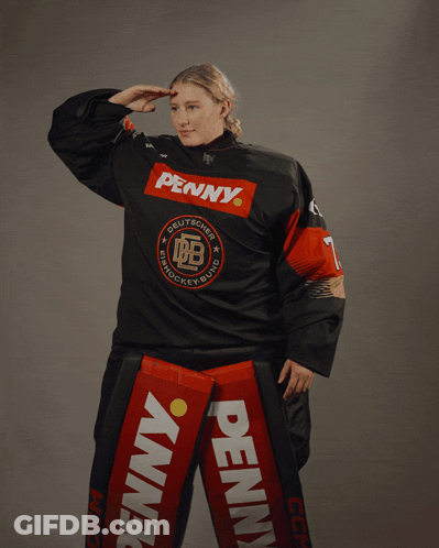 Woman In Black Jersey With Penny On Front GIF