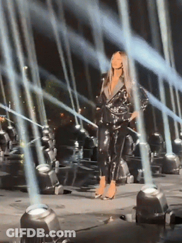 Woman In Black Jumpsuit GIF