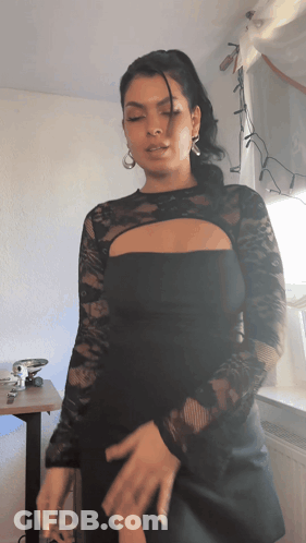 Woman In Black Lace Top Dancing GIF