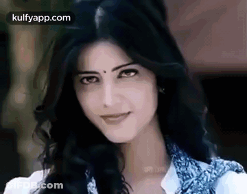 Woman In Black Leather Jacket At Computer GIF