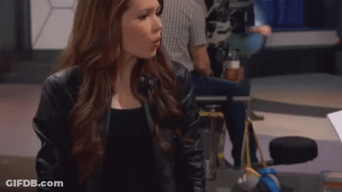 Woman In Black Leather Jacket At Computer GIF