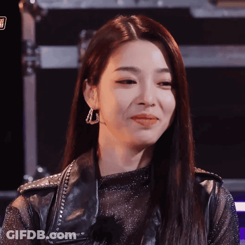 Woman In Black Leather Jacket Close Up GIF