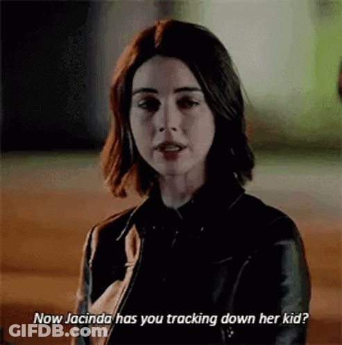 Woman In Black Leather Jacket Talking To Man GIF