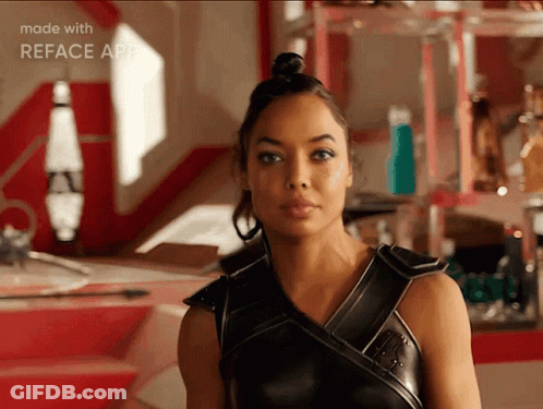 Woman In Black Leather Outfit GIF