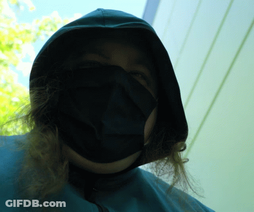 Woman In Black Mask And Hood GIF
