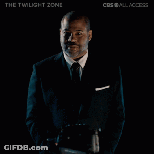 Woman In Black Mask With A Necklace GIF