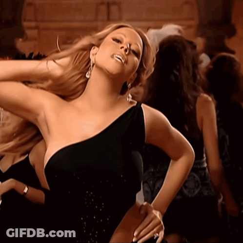 Woman In Black One-Shoulder Dress Dancing GIF