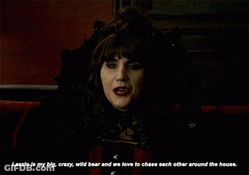 Woman In Black Saying Laszlo Big Crazy Wild Bear GIF