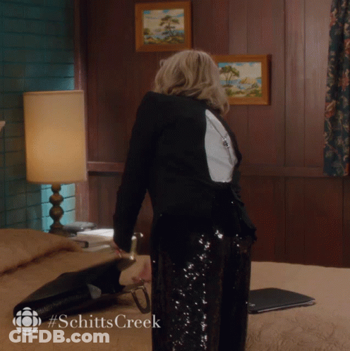 Woman In Black Sequined Skirt Standing On Bed #SchittsCreek GIF