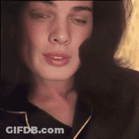 Woman In Black Shirt Close Up GIF