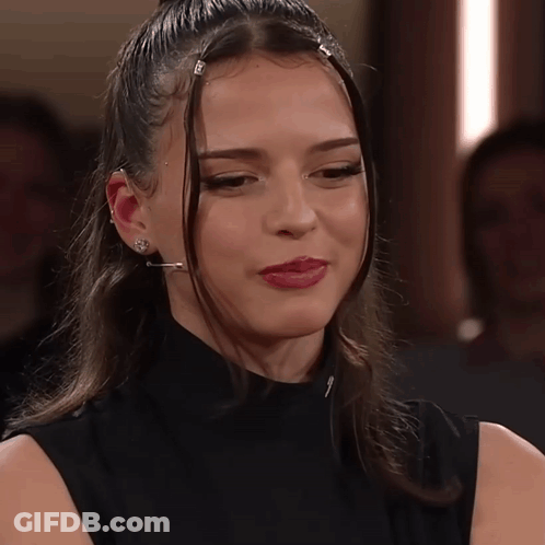 Woman In Black Shirt Close Up GIF