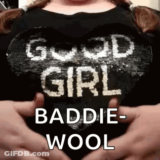 Woman In Black Shirt Good Girl Baddie Wool Holding Breasts GIF