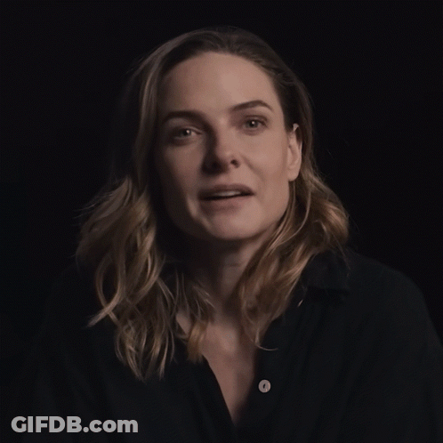 Woman In Black Shirt Holding Hands Up GIF