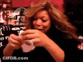 Woman In Black Shirt Holding Paper GIF