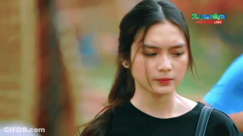 Woman In Black Shirt In Front Of Kapamilya Online Live Screen GIF
