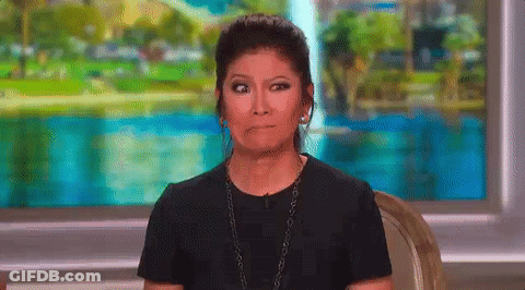 Woman In Black Shirt Making Funny Face GIF
