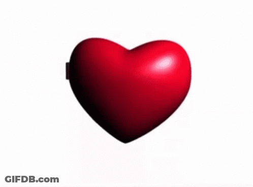 Woman In Black Shirt Making Heart With Hands GIF