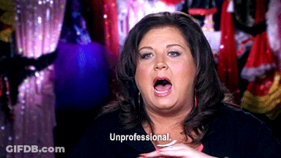 Woman In Black Shirt Saying About Us GIF