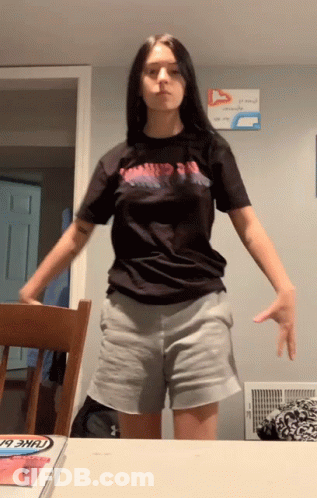 Woman In Black Shirt Saying Almost Gone GIF