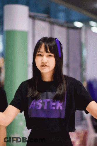 Woman In Black Shirt Saying Aster GIF