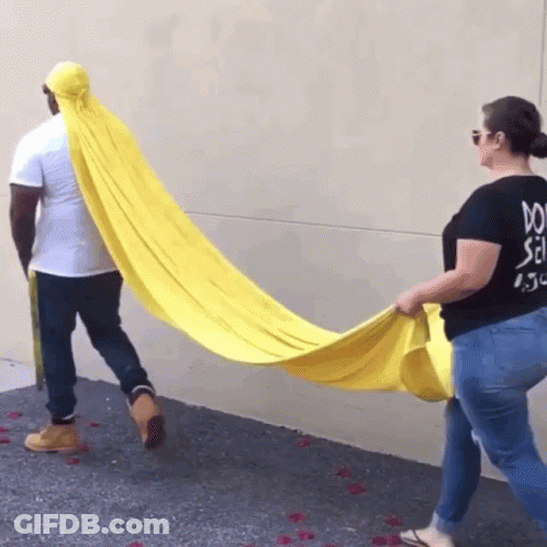 Woman In Black Shirt Saying Do Holding Yellow Blanket GIF