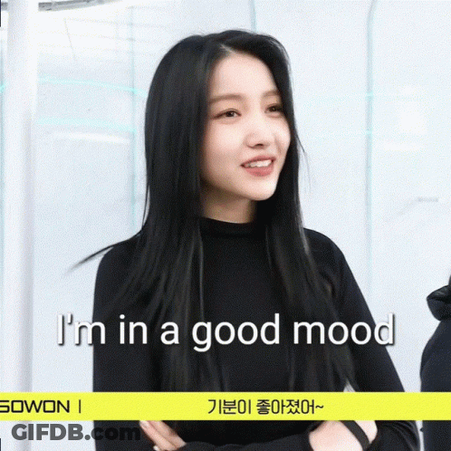 Woman In Black Shirt Saying I'm In A Good Mood GIF