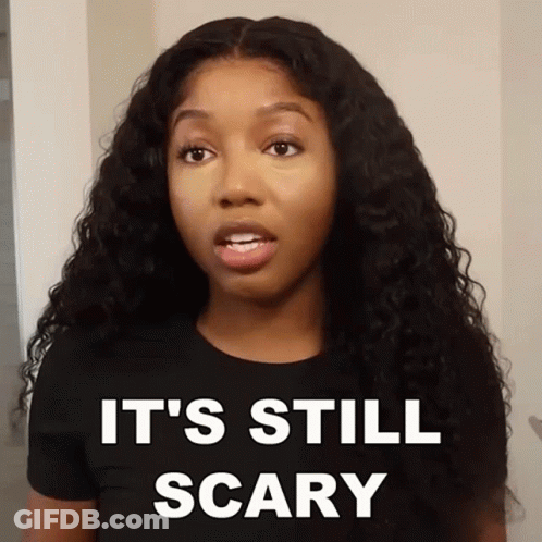 Woman In Black Shirt Saying It's Still Scary GIF
