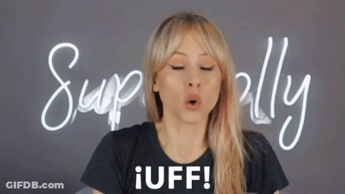Woman In Black Shirt Saying Iuff With Superally Sign GIF