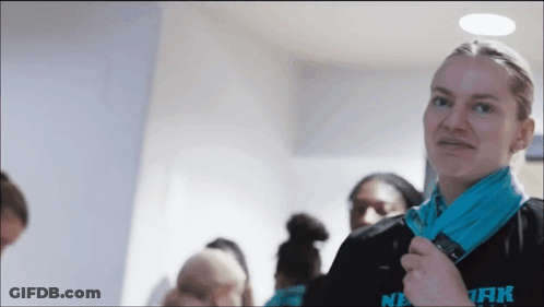 Woman In Black Shirt Saying New York GIF