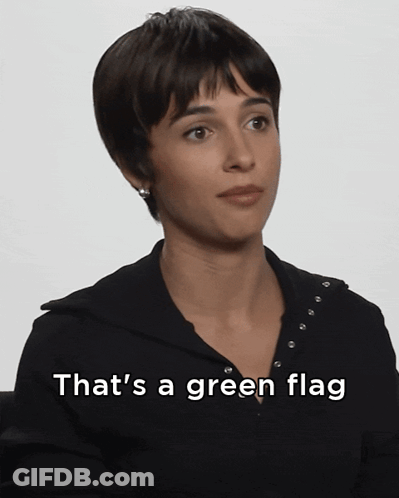 Woman In Black Shirt Saying That's A Green Flag GIF