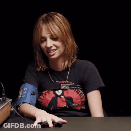 Woman In Black Shirt Saying Torpedoes GIF