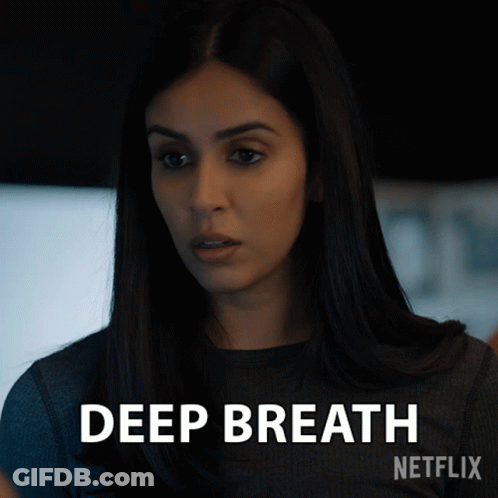 Woman In Black Shirt Says Deep Breath GIF