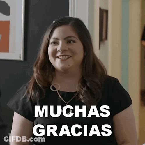 Woman In Black Shirt Says Muchas Gracias GIF