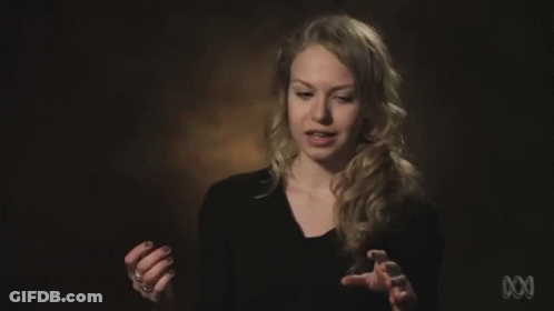 Woman In Black Shirt With ABC Letters GIF
