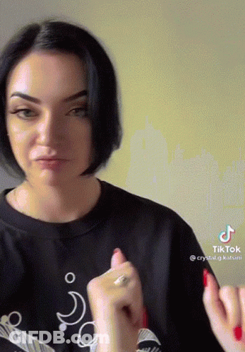 Woman In Black Shirt With TikTok Sticker GIF