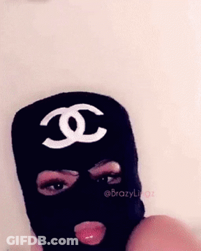 Woman In Black Ski Mask With Chanel Logo GIF