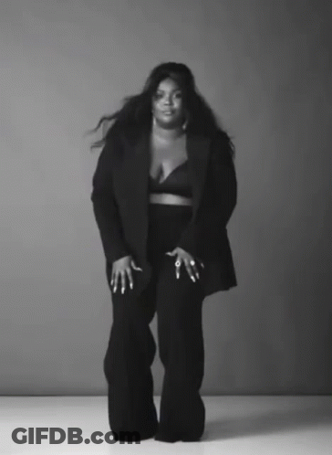 Woman In Black Suit Black And White Photo GIF