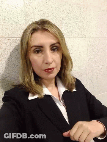 Woman In Black Suit Giving Thumbs Up GIF