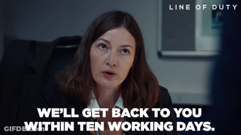 Woman In Black Suit Says We'll Get Back To You Within Ten Working Days GIF