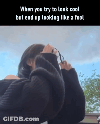 Woman In Black Sweater Covering Face With Glasses Saying When You Try To Look Cool GIF