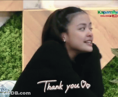 Woman In Black Sweater Giving Thank You Sign GIF