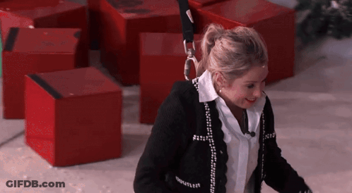 Woman In Black Sweater With Chanel GIF