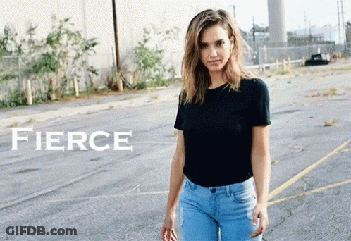Woman In Black T-Shirt And Blue Jeans With Word Fierce GIF